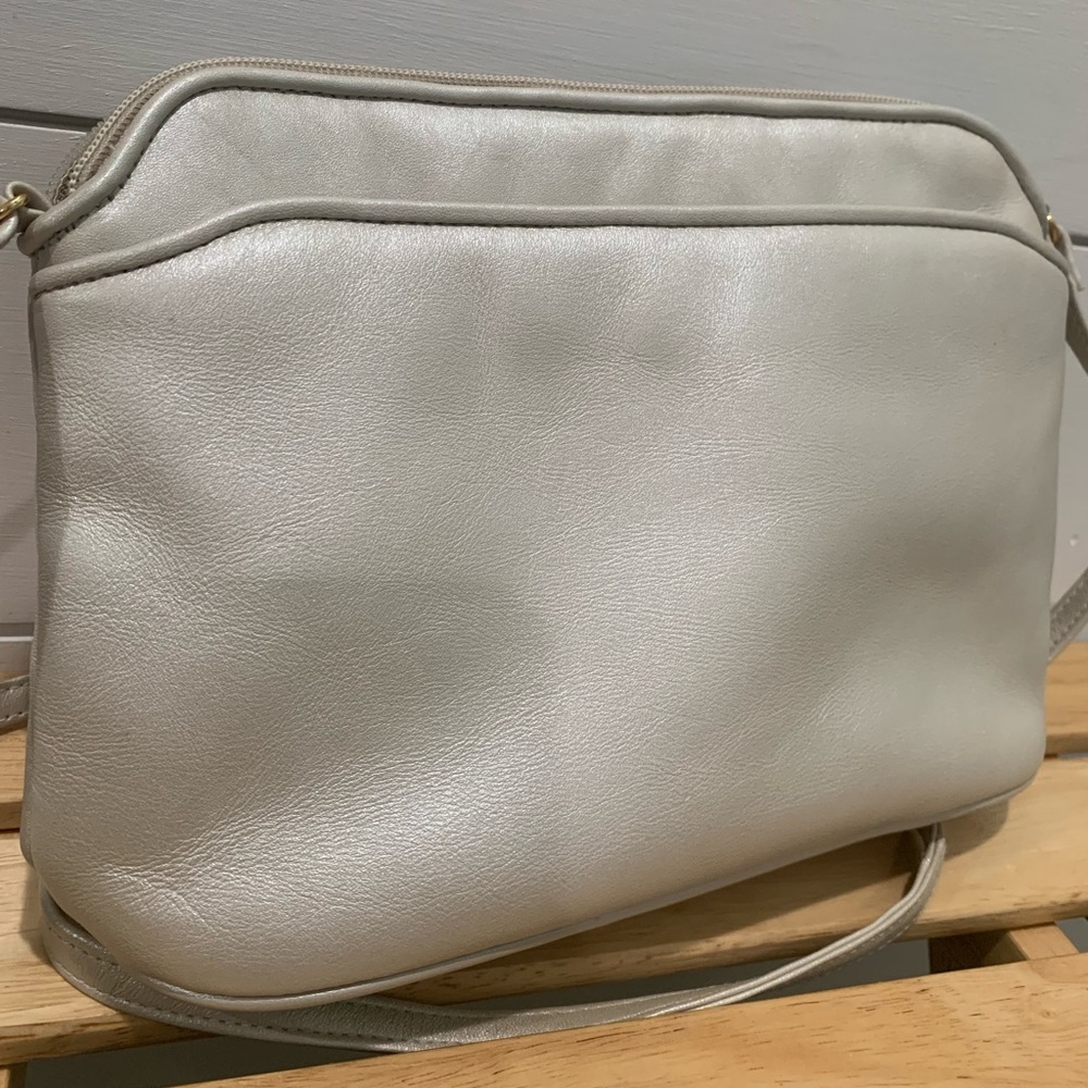Preston & York, pearl white leather purse. With zipper and front pocket.